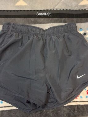 Nike Gray Women's Lightweight Athletic Shorts with White Swoosh
